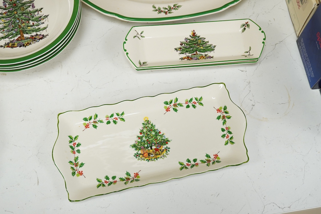 A Spode table service, Christmas Tree pattern. S 3324 to include a set of four bowls, platter and dishes, with some boxes, largest 36cm wide